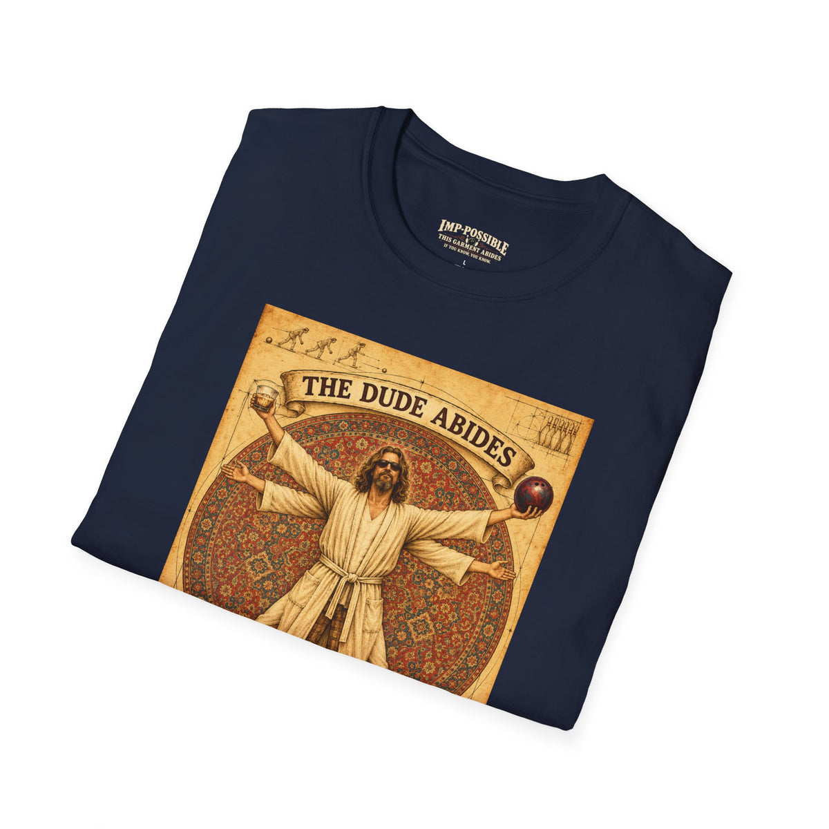 Folded Navy The Dude Abides T-shirt showing front artwork and custom neck print.