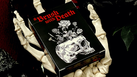 A Brush with Death playing cards collector deck featuring dark memento mori artwork and artistic skull design