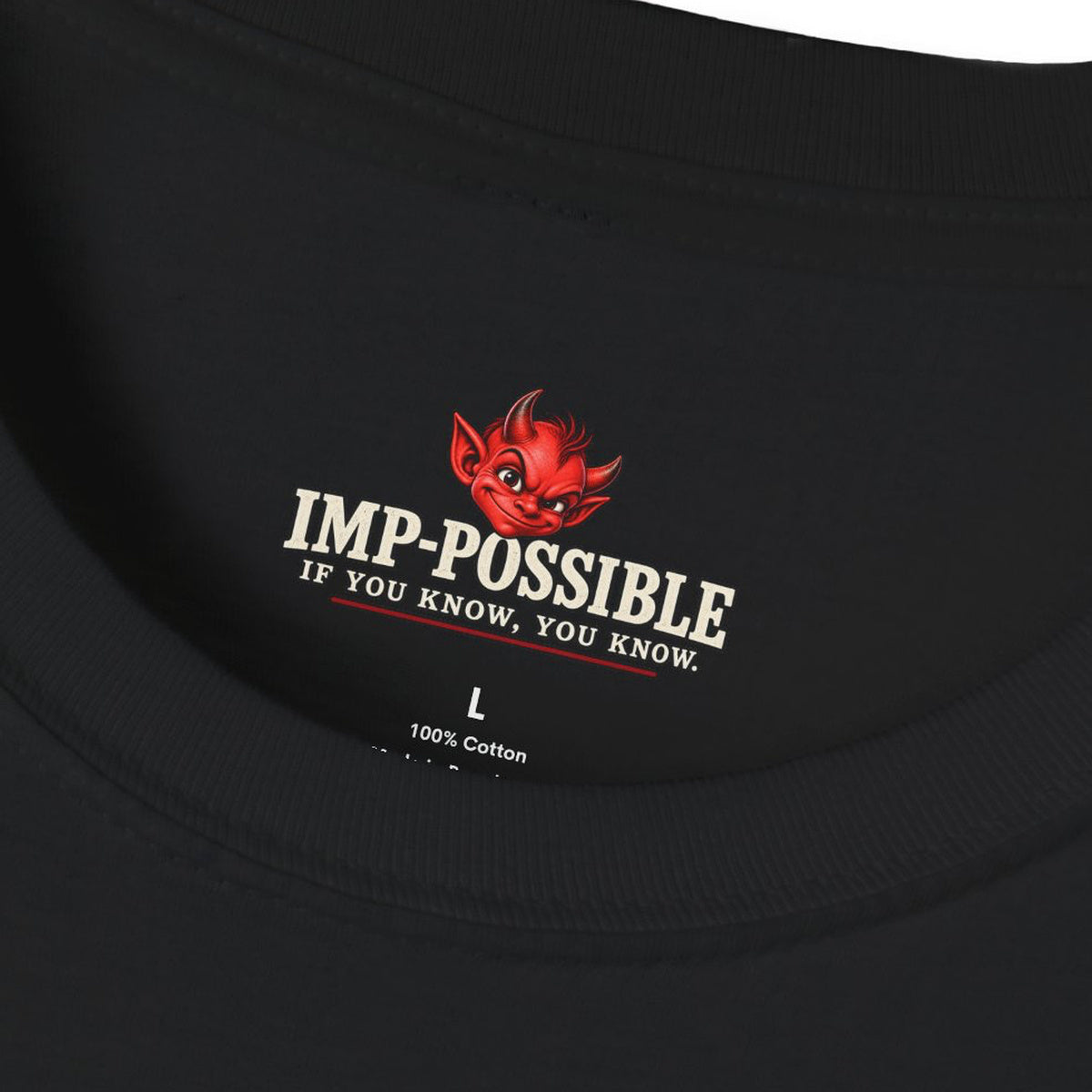 Printify neck-label mockup inside black Tesla vs. Edison T-shirt showing IMP-POSSIBLE red imp logo, motto and size L