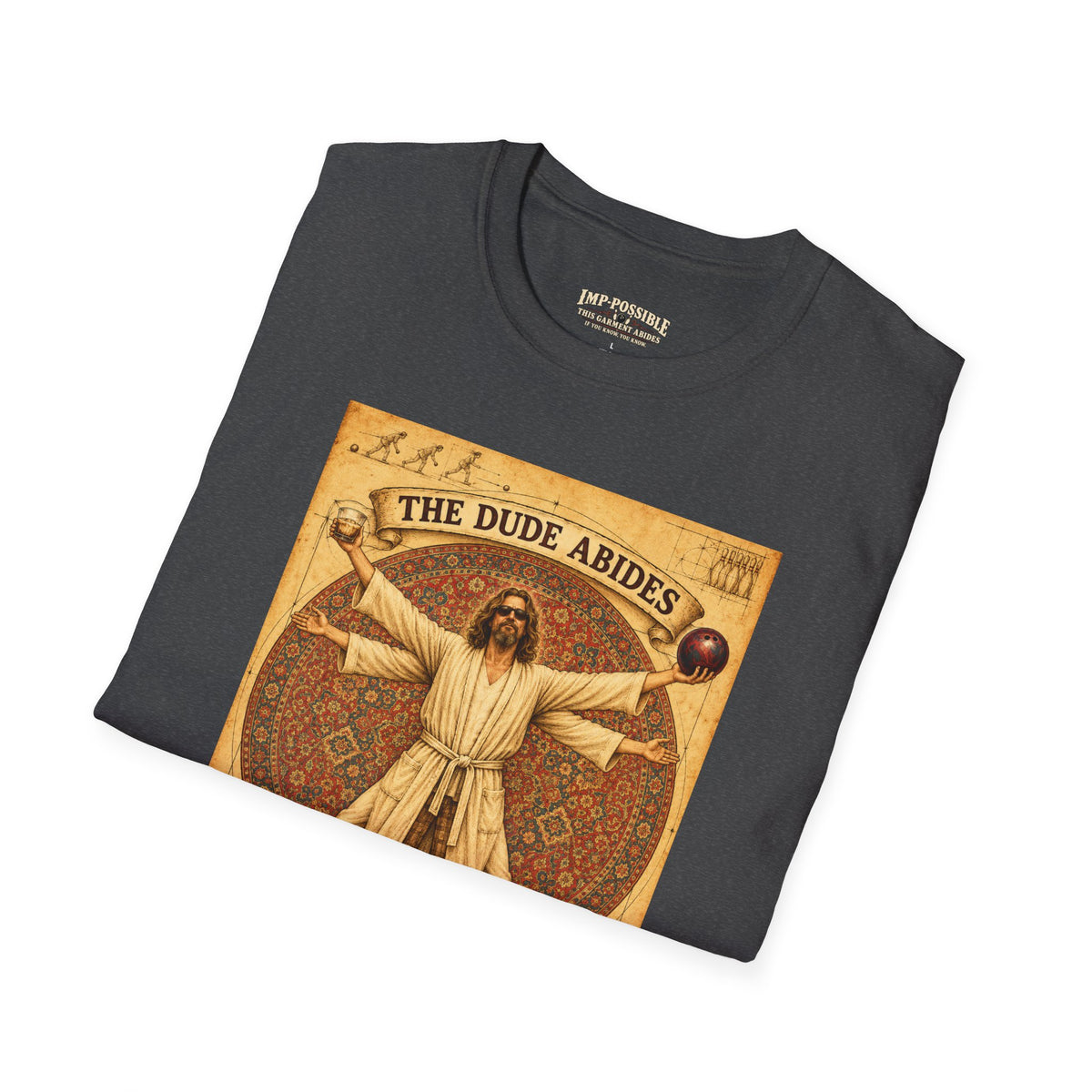 Folded Dark Heather The Dude Abides T-shirt with vintage bowling artwork.