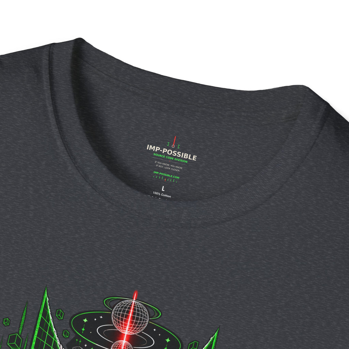 Close-up of the dark heather shirt neckline showing its IMP-POSSIBLE inner label and part of the green front graphic.