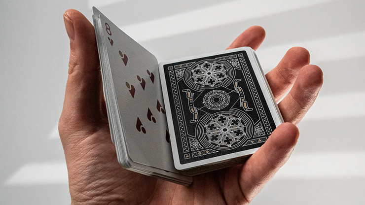 Ascend XIX Playing Cards fan spread showing ornate gold artwork