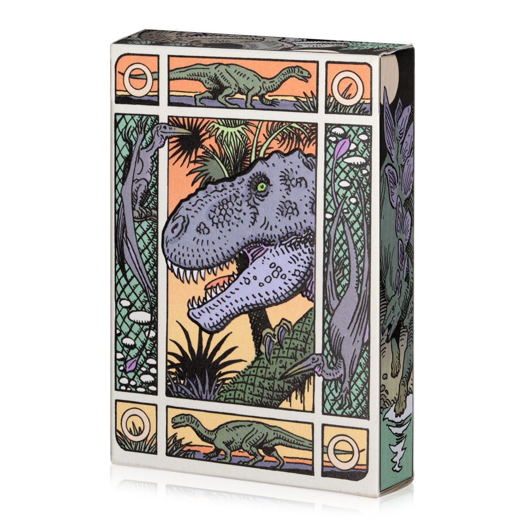 Dinosaur playing cards tuck box featuring illustrated prehistoric artwork by William Stout