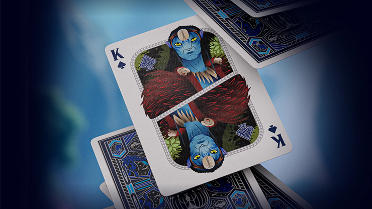 King of Spades Na’vi character card from Avatar playing cards by theory11 displayed on stacked Pandora deck cards with blue cinematic background