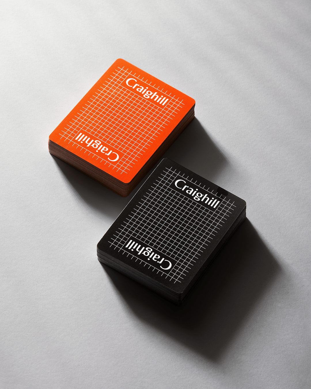 Craighill playing cards black and orange editions displayed together