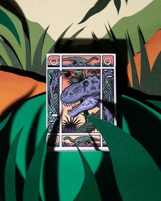 Dinosaur playing cards tuck box featuring illustrated prehistoric artwork by William Stout