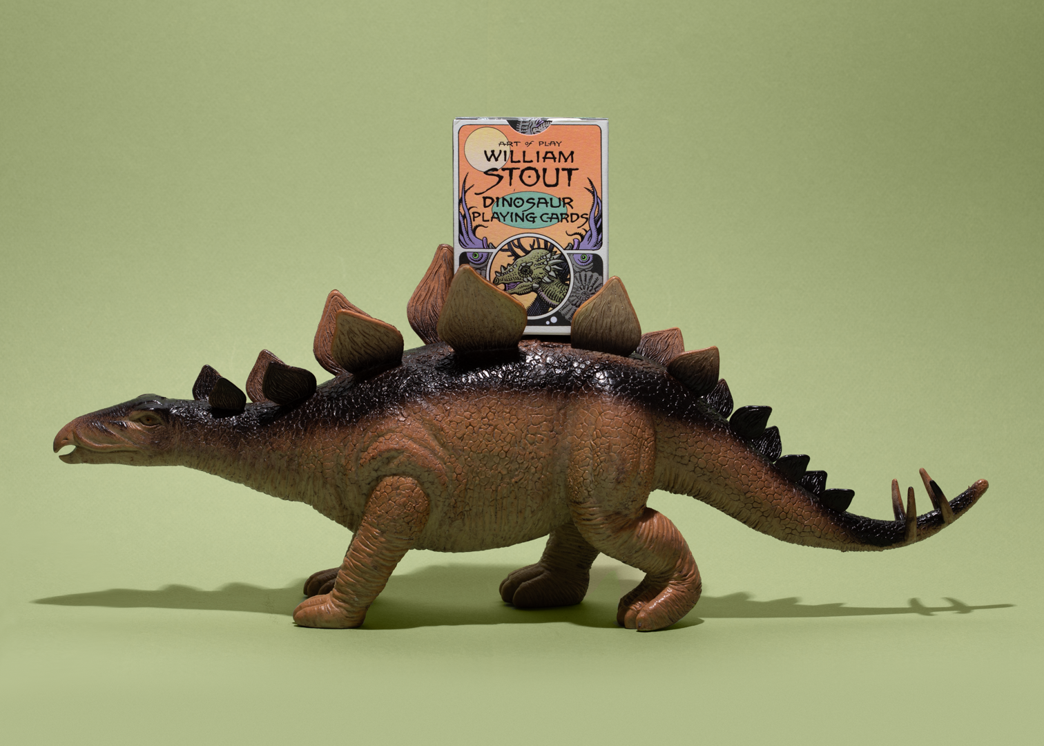 Dinosaur playing card featuring detailed prehistoric illustration