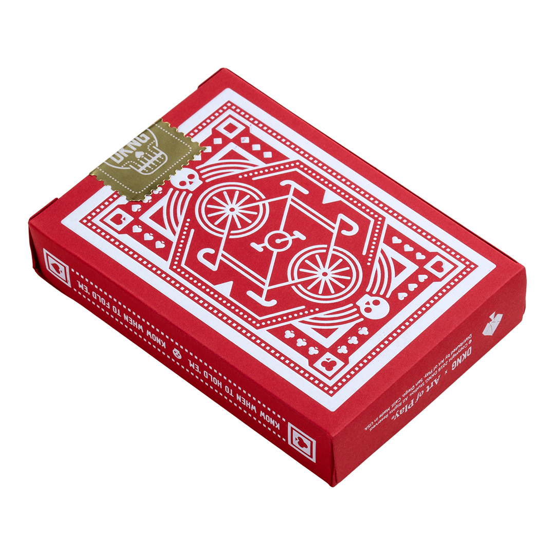 DKNG Red Wheels playing cards tuck box with bold red geometric design