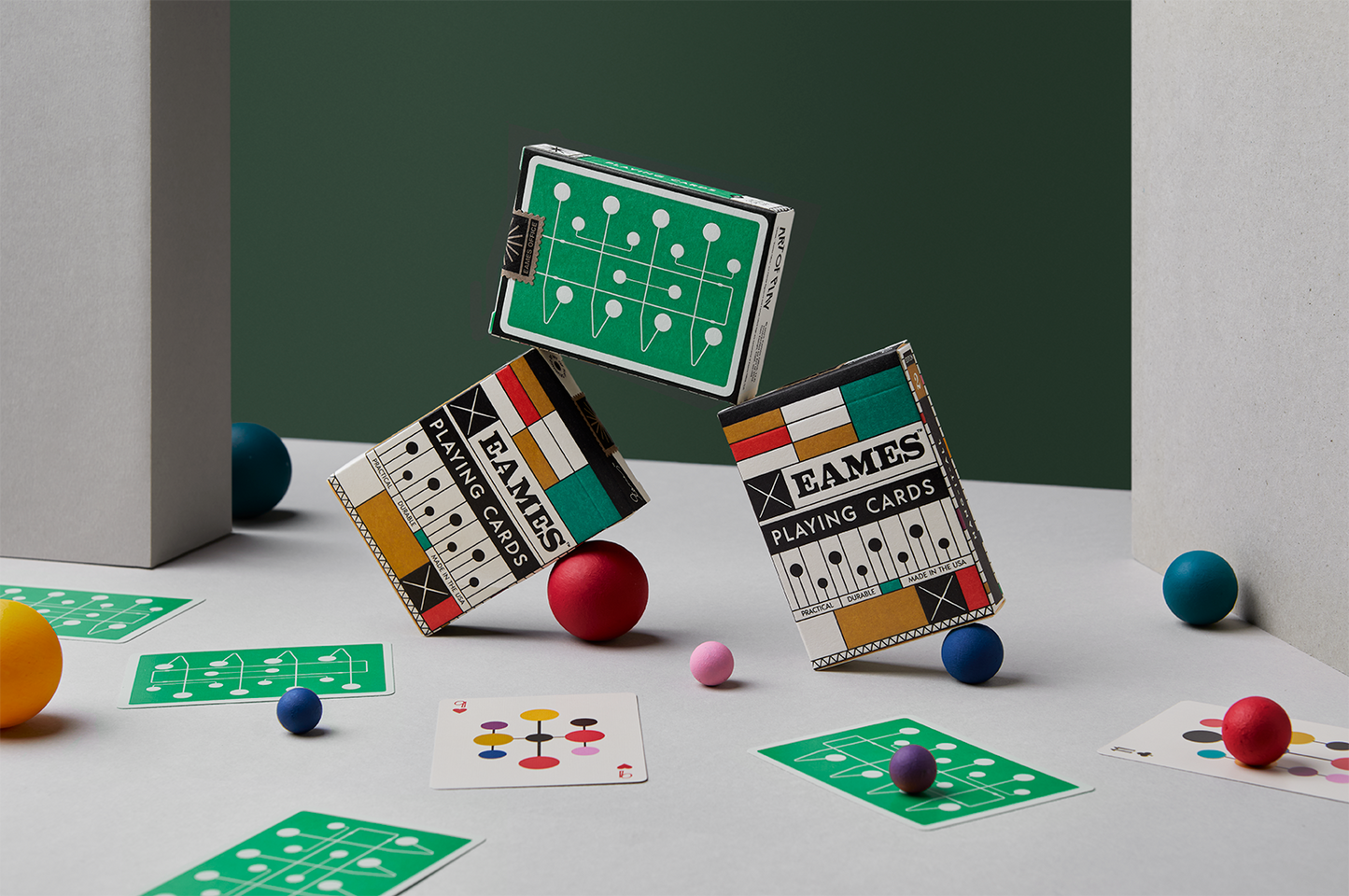 Side view of Eames Hang-It-All playing cards box showing packaging design and structure