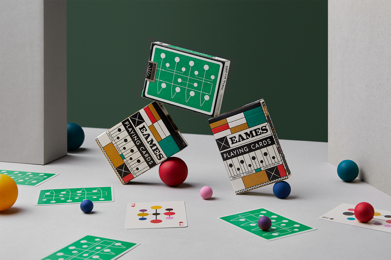 Side view of Eames Hang-It-All playing cards box showing packaging design and structure