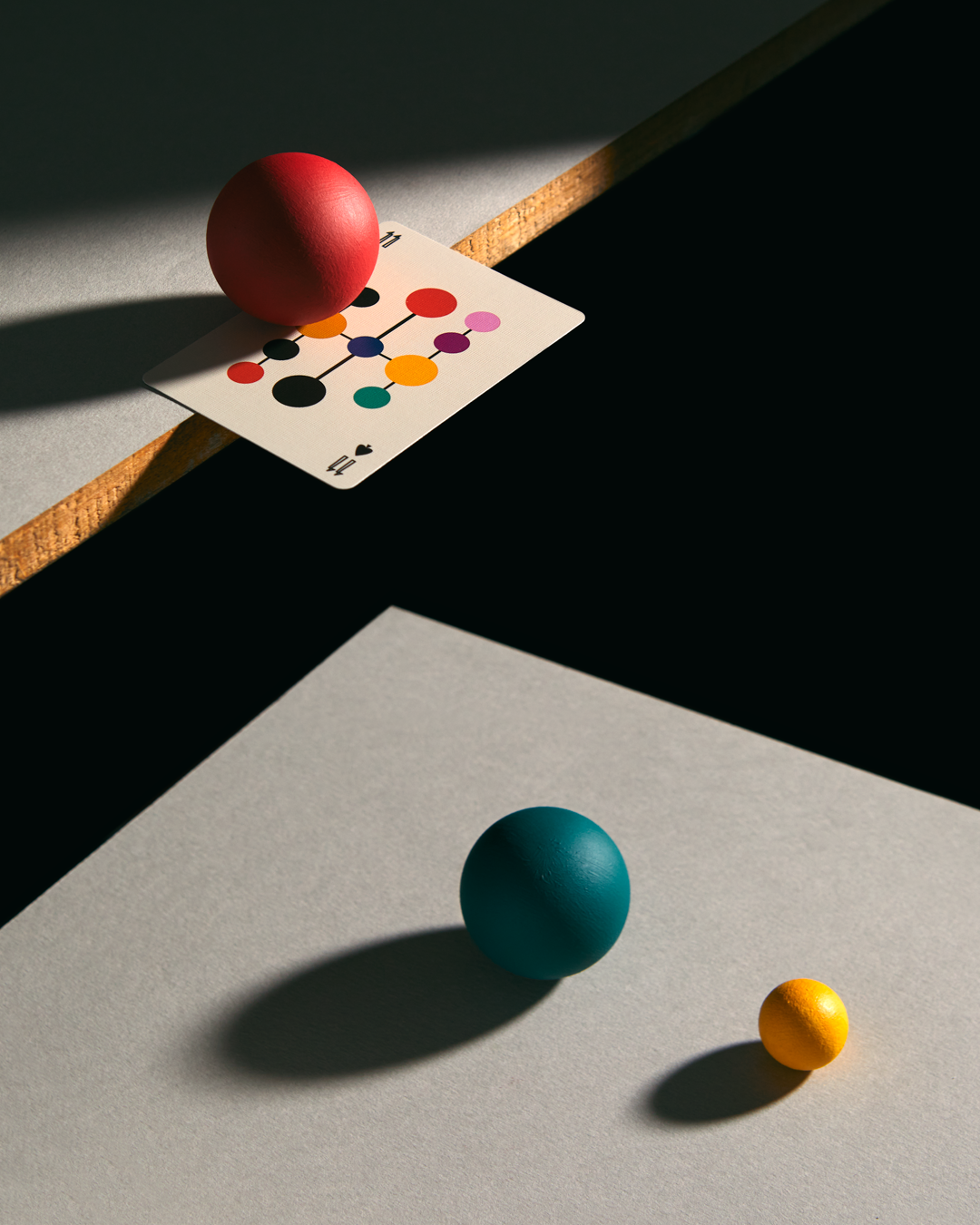 Eames Hang-It-All Playing Cards deck with midcentury modern design and colorful geometric pattern