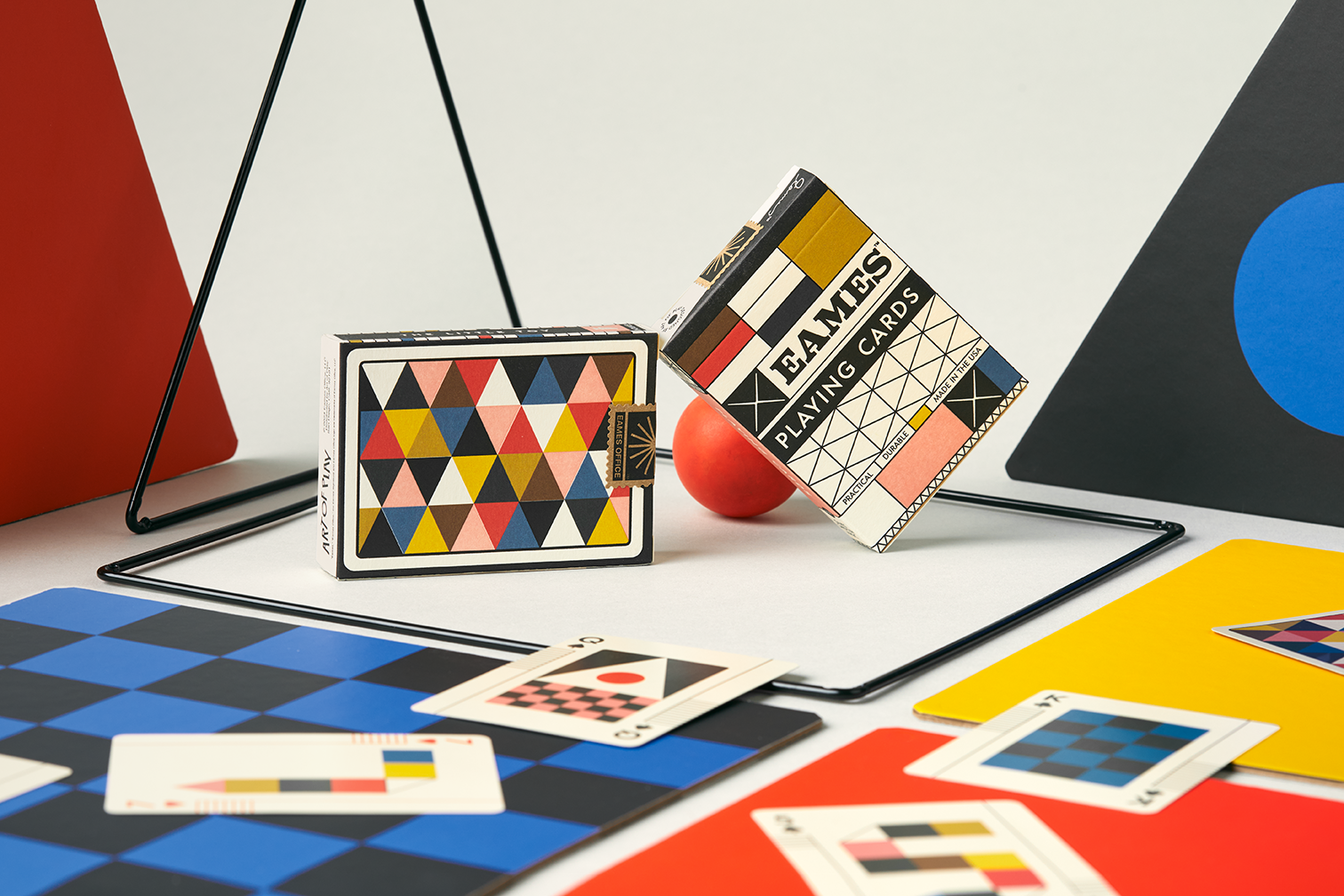 Full deck spread of Eames Little Toy playing cards by Art of Play showing complete geometric system