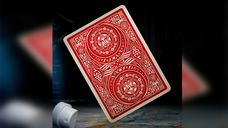 Obey Red Edition playing cards by theory11 featuring the red card back design with star emblem displayed on a dark studio background