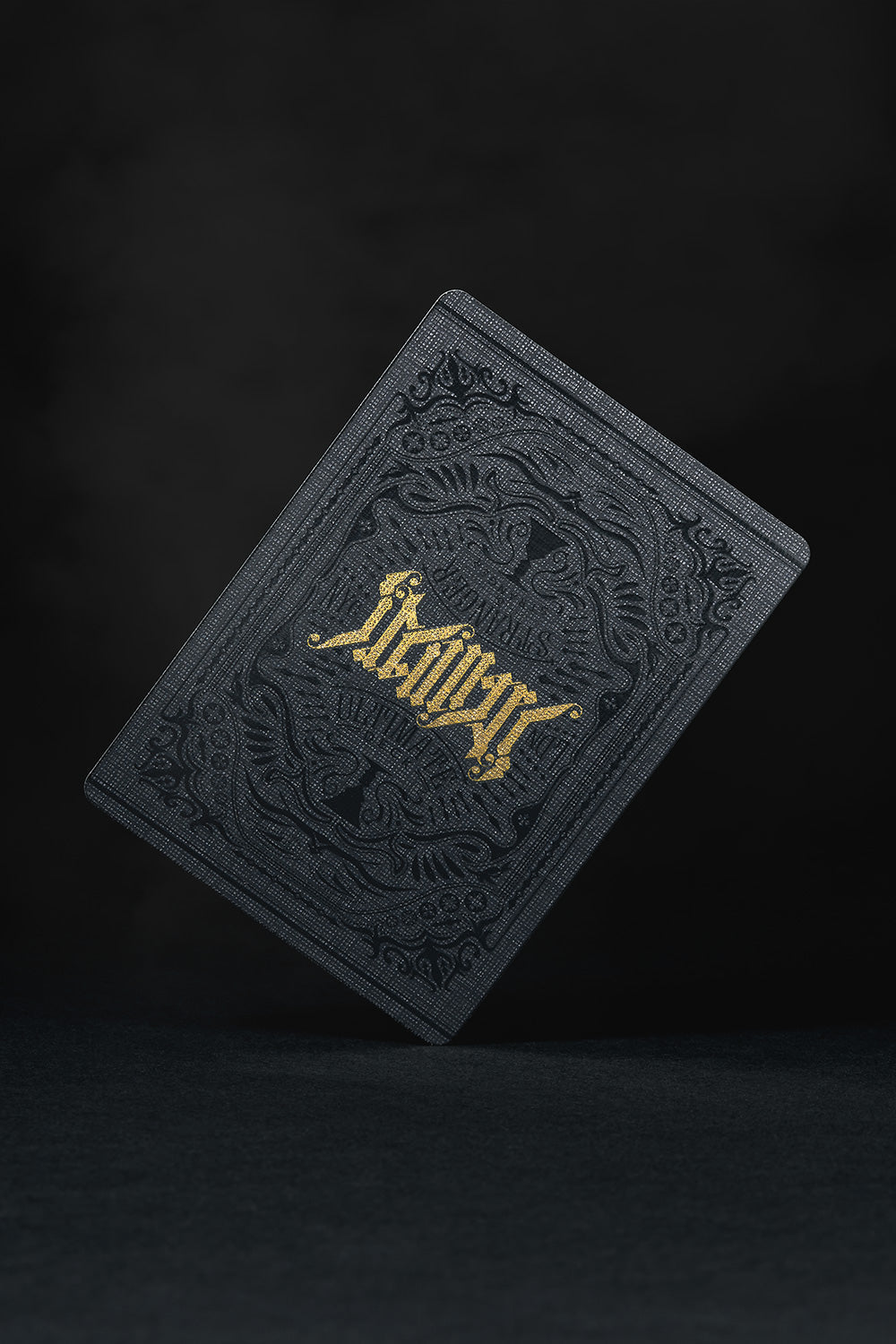 Ultimate Deck by Art of Play playing cards luxury box and card spread on dark background