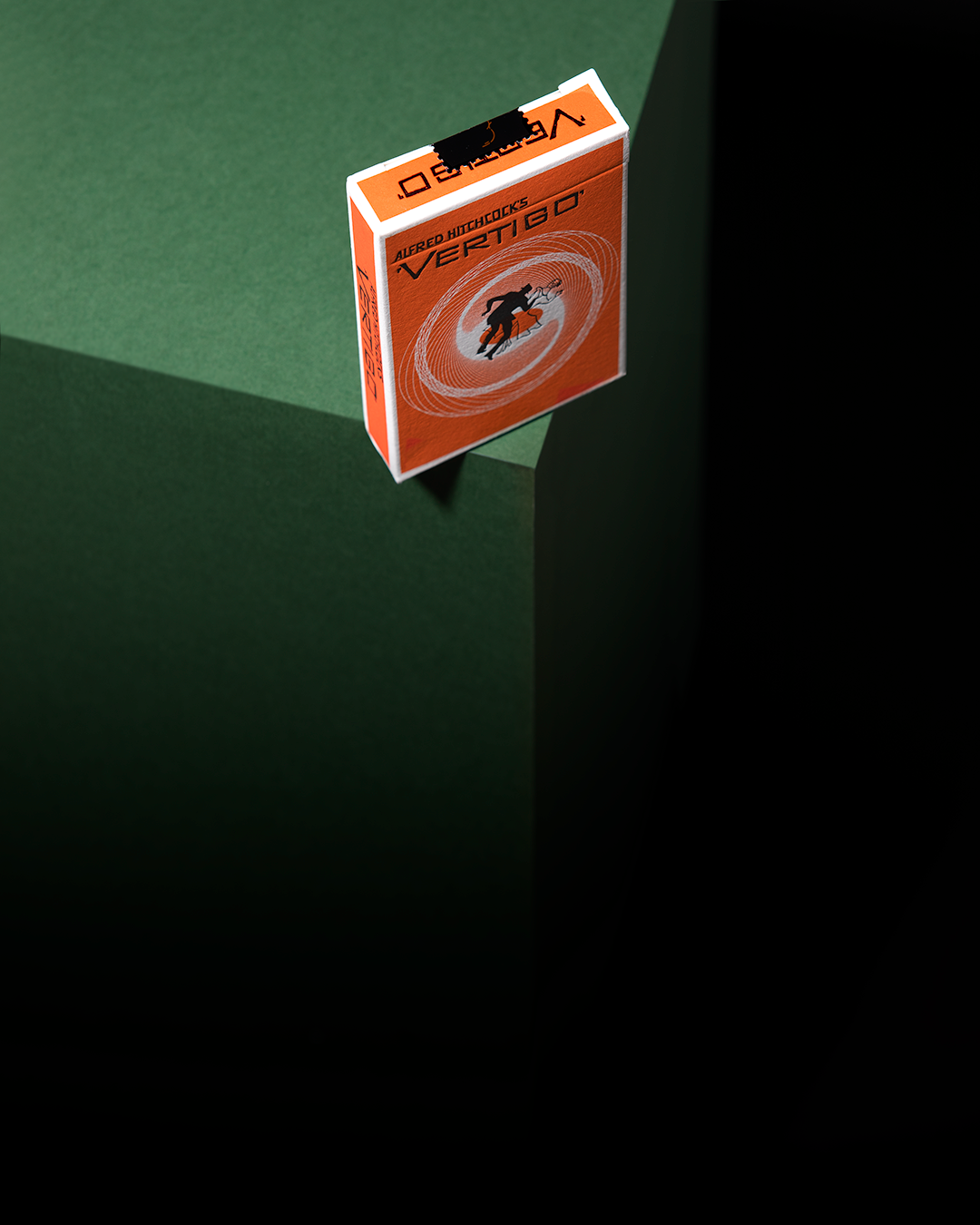 Vertigo playing cards by Art of Play showing tuck box and card faces with high contrast spiral design